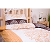 Prodloužené bavlněné povlečení 140x220+70x90 Ornamenty jantarovo-hnědá